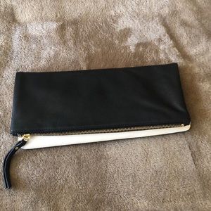 Black and white leather clutch